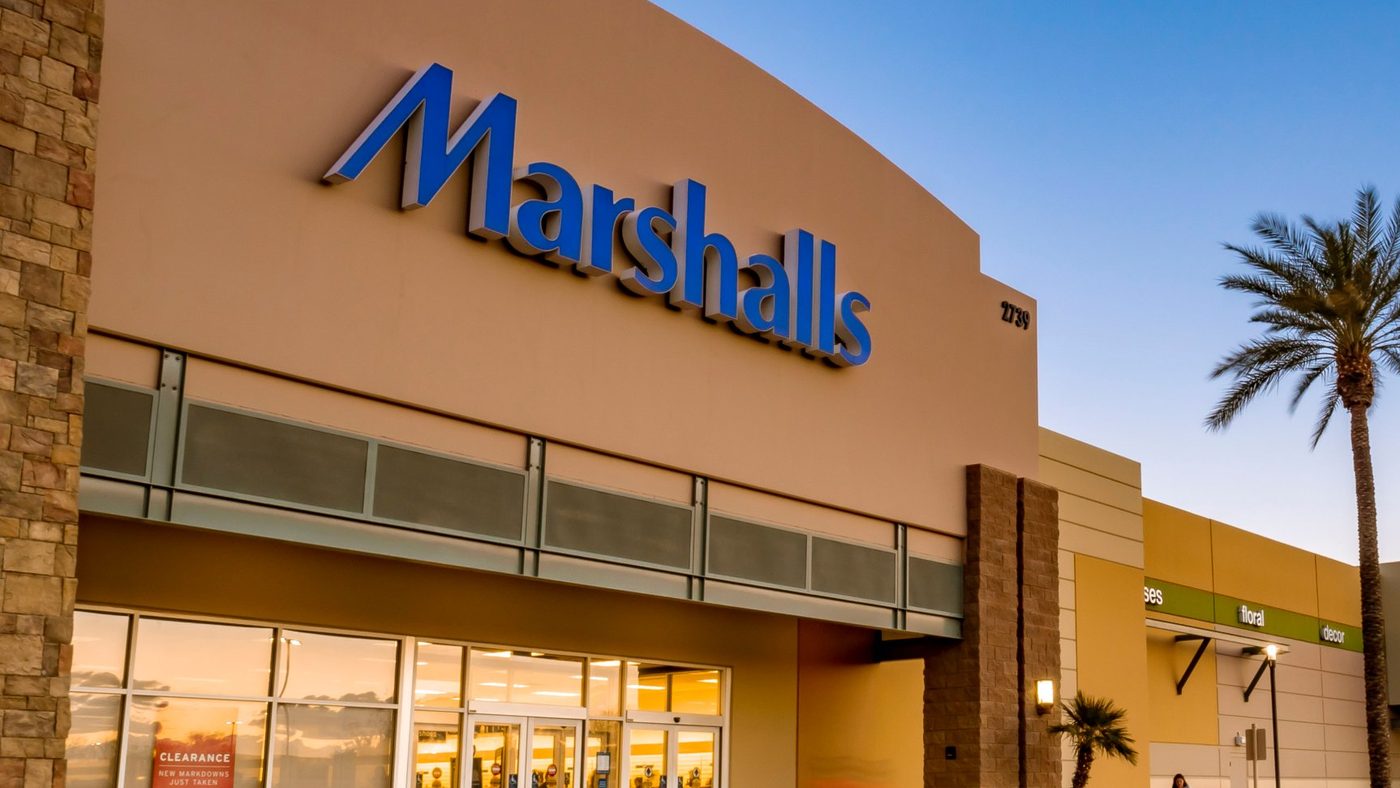 Marshalls storefront at SanTan Village Marketplace at dusk, with palm trees along the walkway
